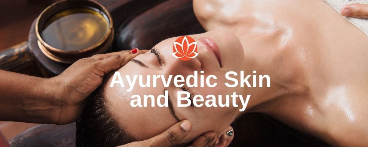 ayurvedic beauty treatment in progress with woman with closed eyes and words ayurvedic skin and beauty